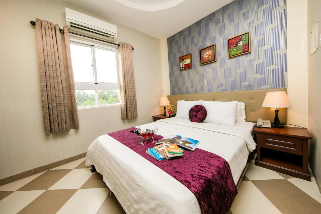 Quy Hung Hotel Central Ho Şi Min Exterior foto