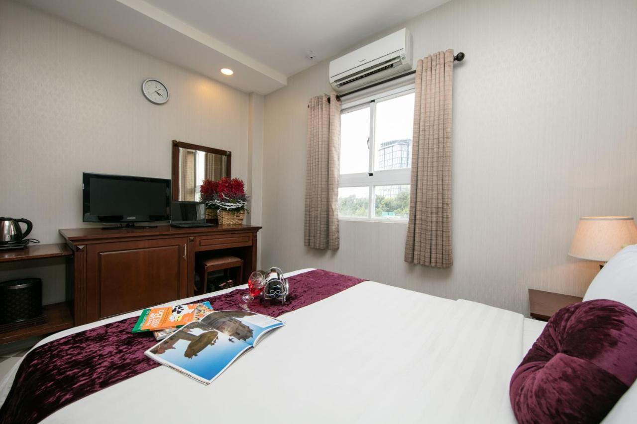 Quy Hung Hotel Central Ho Şi Min Exterior foto